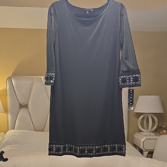 Tiana B. Elegant Black Dress with Embellished Cuffs - Picture 1 of 15
